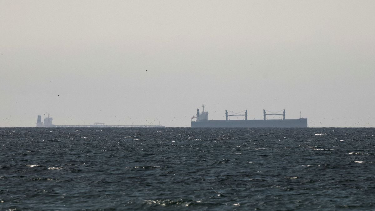 A cargo ship in the Gulf, near the Strait of Hormuz, as seen from northern Ras al-Khaimah, near the border with Oman’s Musandam governance, amid the US-Israeli conflict with Iran, in United Arab Emirates | Reuters