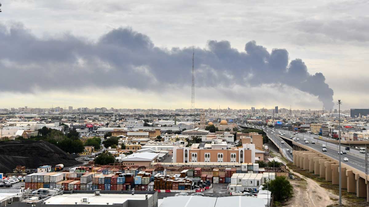 Smoke rises from Kuwait international airport after a drone strike on fuel storage in Kuwait City, Kuwait | AP