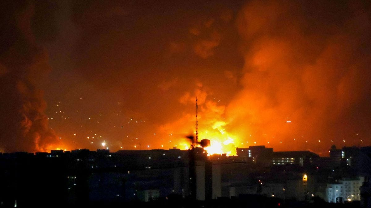 Smoke and fire rise from the site of airstrikes at Mehrabad International Airport in Tehran | AFP
