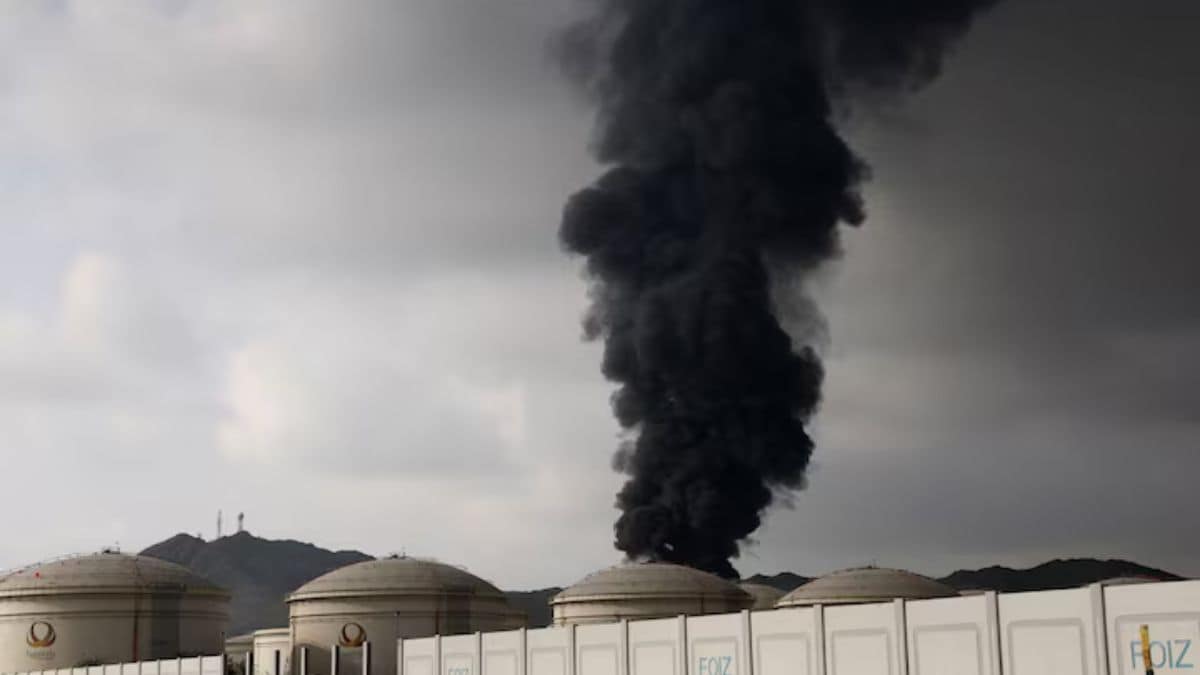 [File] Smoke rising in the Fujairah oil industry zone on March 4, 2026, following a fire caused by debris after interception of a drone by air defenses, according to the Fujairah media office, amid the US-Israel conflict with Iran | Reuters