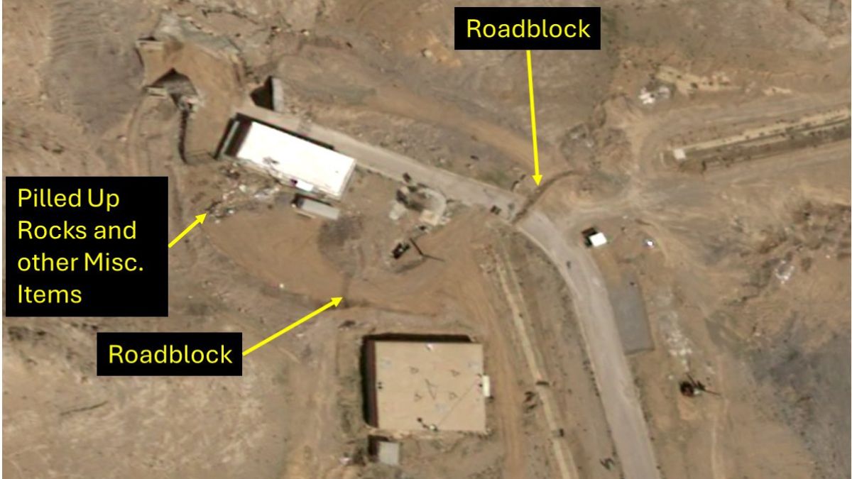 Makeshift roadblocks put up outside the three tunnel entrances to the underground facility at the Esfahan Nuclear Complex | X 