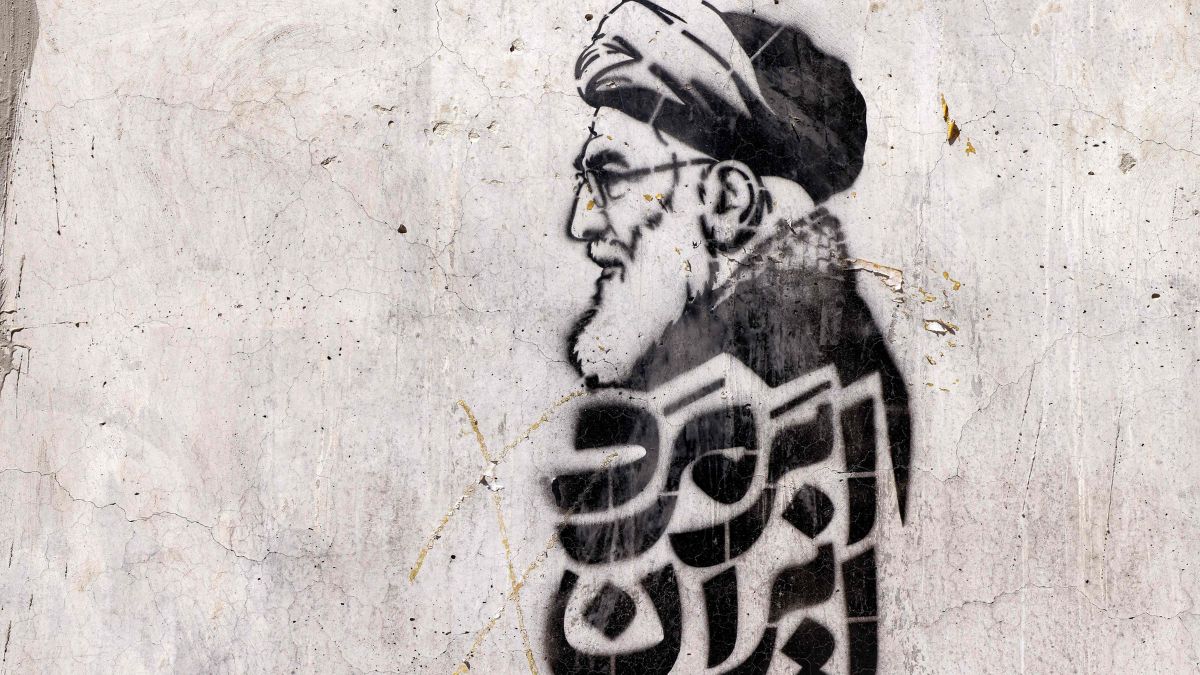 A stencil graffiti depicting Iran's slain supreme leader Ayatollah Ali Khamenei is pictured on the wall of a building at Sharif University of Technology in Tehran | AFP 