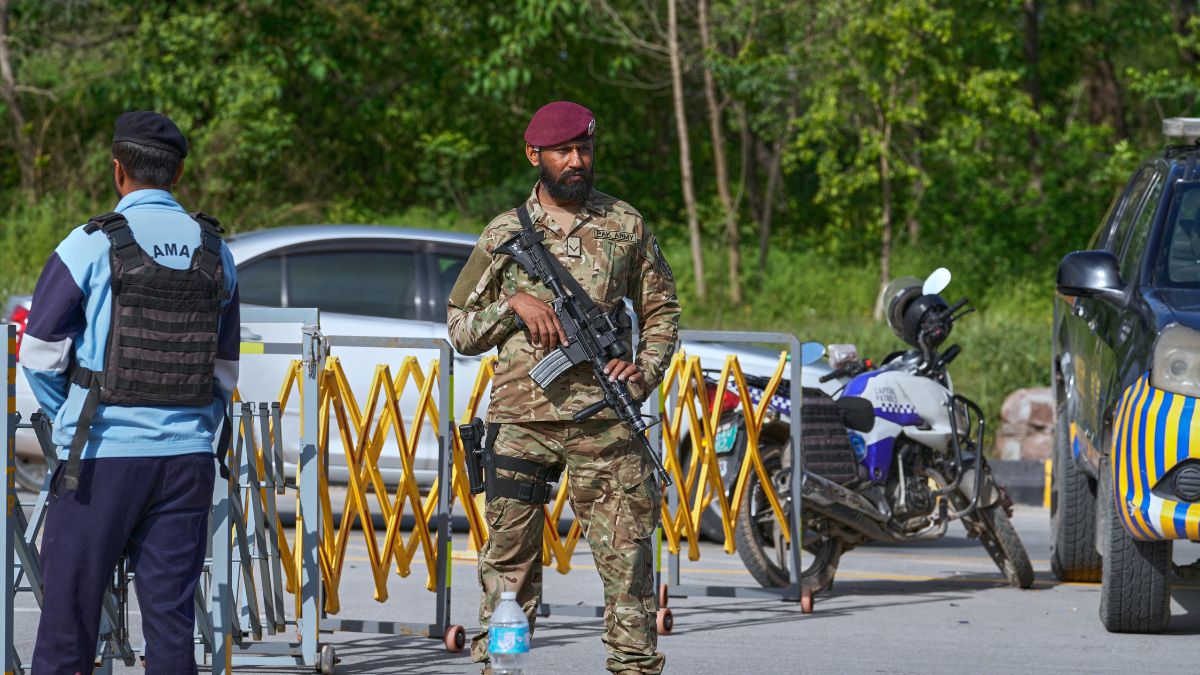 An Army commando stands guard at a checkpoint near Pakistan's foreign ministry to ensure security ahead of the United States and Iran possible negotiations in Pakistani capital after two-week ceasefire, in Islamabad | AP