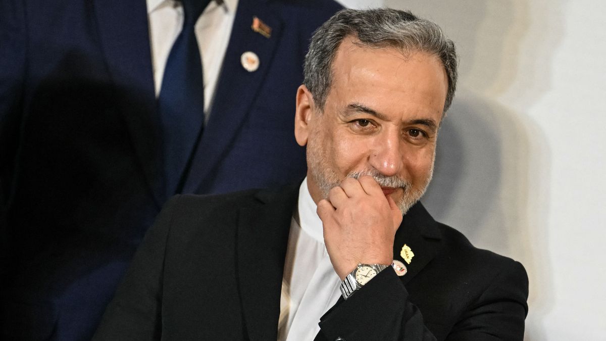 Iran's Foreign Minister Abbas Araghchi gestures as he arrives for a group photograph during the BRICS Foreign Ministers meeting at the Bharat Mandapam in New Delhi | AFP 