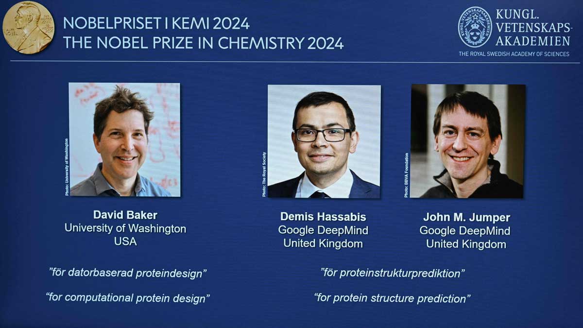 Images of David Baker, Demis Hassabis and John Jumper, who are awarded the Nobel Prize in chemistry are displayed on the day of the announcement of the winners, in Stockholm | AFP