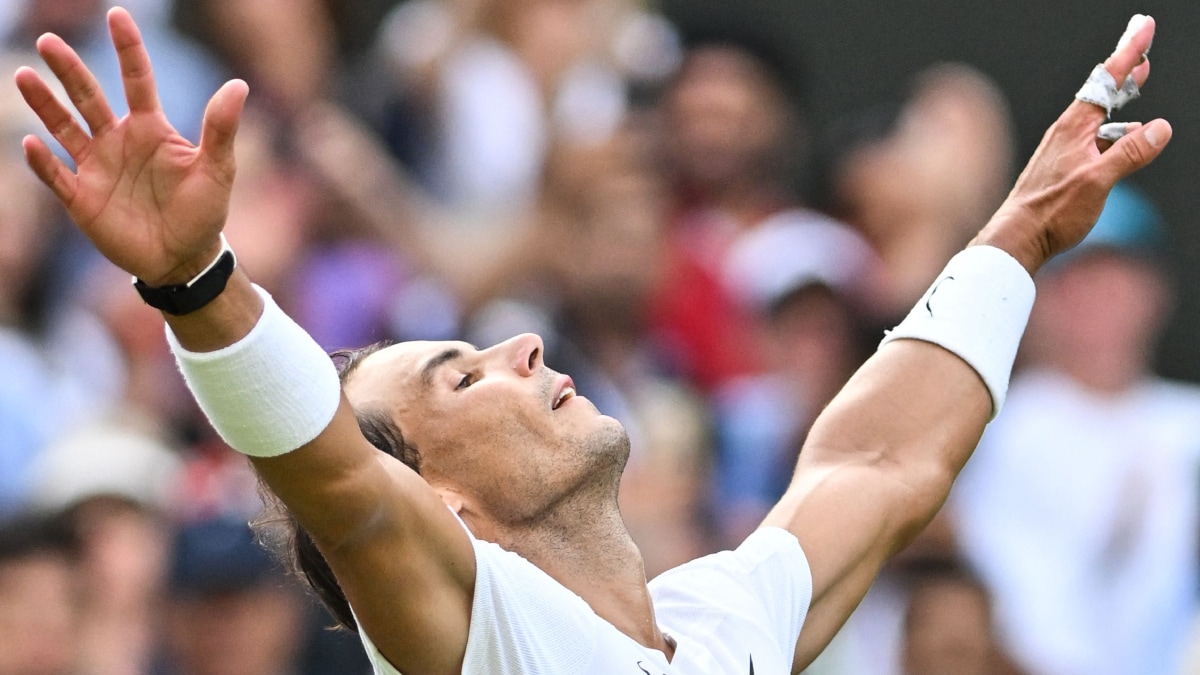 Rafael Nadal celebrates winning against US player Taylor Fritz after winning his men's singles quarter final tennis match on the tenth day of the 2022 Wimbledon Championships | AFP