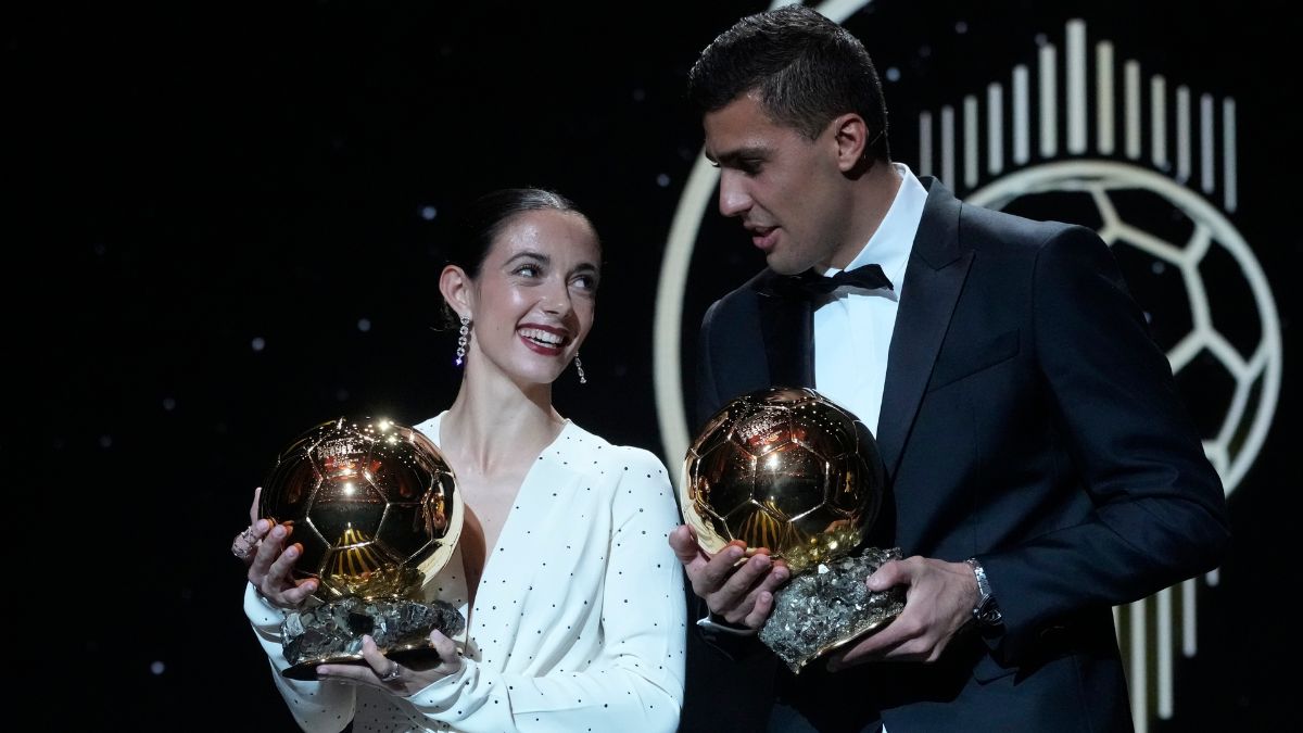 Barcelona's Spanish player Aitana Bonmati and Manchester City's Spanish player Rodri hold their 2024 Ballon d'Or trophies during the 68th Ballon d'Or (Golden Ball) award ceremony at Theatre du Chatelet in Paris on October 28, 2024 | AP
