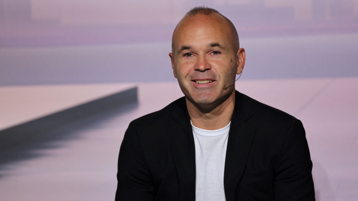 Spanish footballer Andres Iniesta talks during an event to celebrate his career at the America's Cup Experience venue in Barcelona | AFP