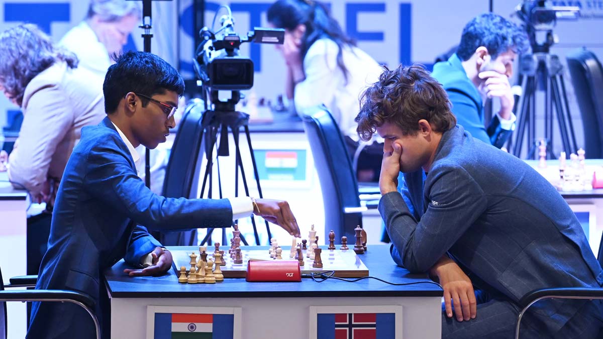 Praggnanandhaa and  Magnus Carlsen at Tata steel Rapid chess tournament in Kolkata today | Salil Bera