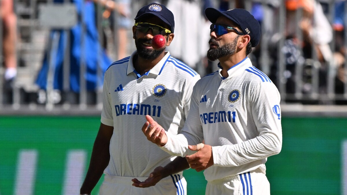 Indias Virat Kohli and Jasprit Bumrah during the Perth Test | AFP