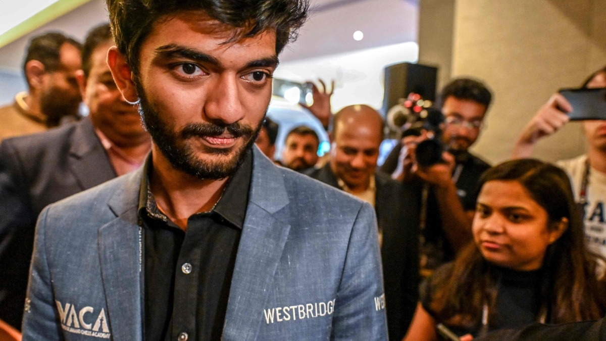 The 'WACA' on the world champion D Gukesh’s blazer is the WestBridge-Anand Chess Academy | AFP