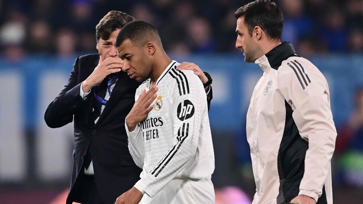 Real Madrid's Kylian Mbappe leaves the pitch after an injury during the UEFA Champions League football match against Atalanta | AFP