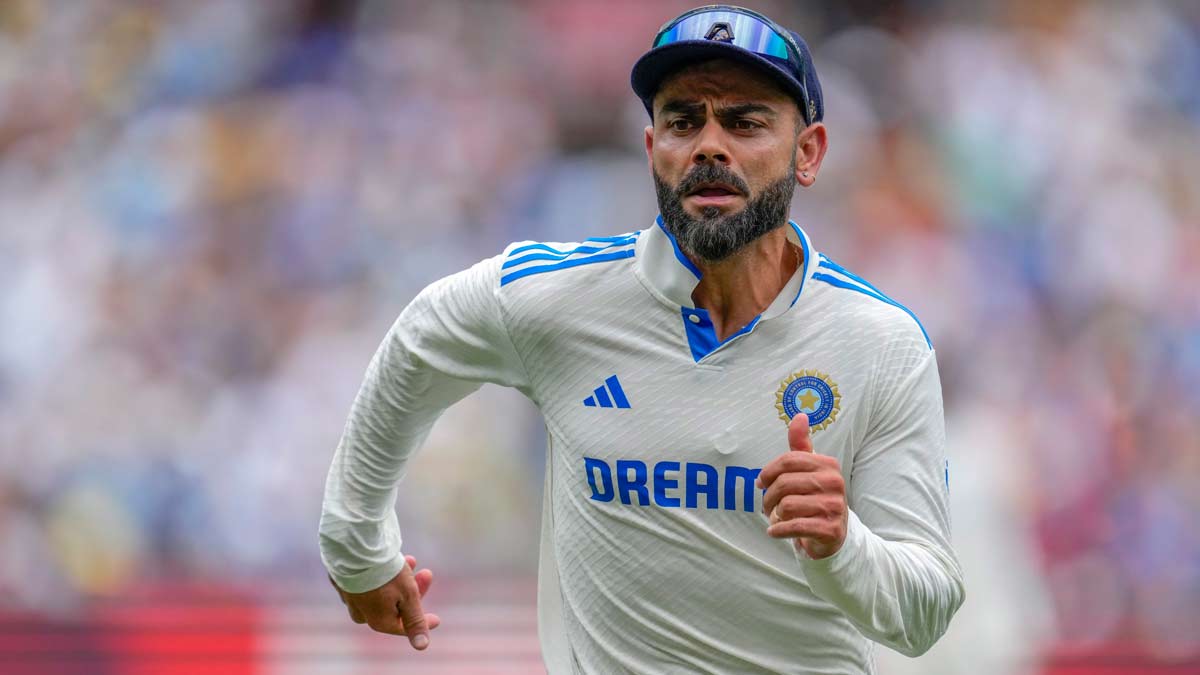 Virat Kohli chases the ball during play on the first day of the fourth Test between Australia and India at the Melbourne Cricket Ground | AP/PTI
