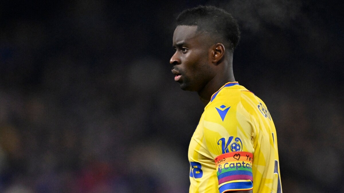 General view of a message written on the armband of Crystal Palace's Marc Guehi | Reuters