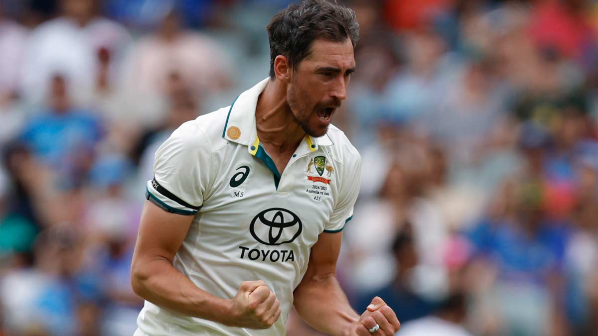 Mitchell Starc celebrates the dismissal of Virat Kohli on day one of the second Test match between Australia and India at the Adelaide Oval | AP