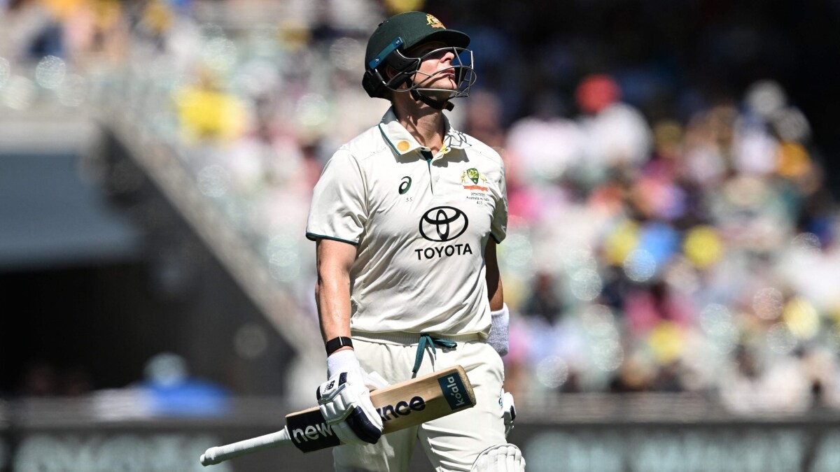 Australia's Steve Smith reacts in frustration after being dismissed by India's Jasprit Bumrah | AFP