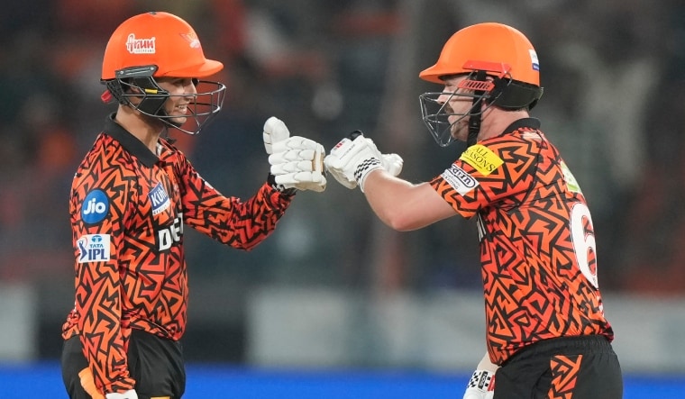 Sunrisers Hyderabad's Travis Head (R) celebrates his fifty runs with Abhishek Sharma | AP
