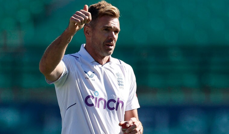 England's James Anderson acknowledges the crowd after taking his 700th Test wicket, in the fifth and final Test against India in Dharamsala | Reuters