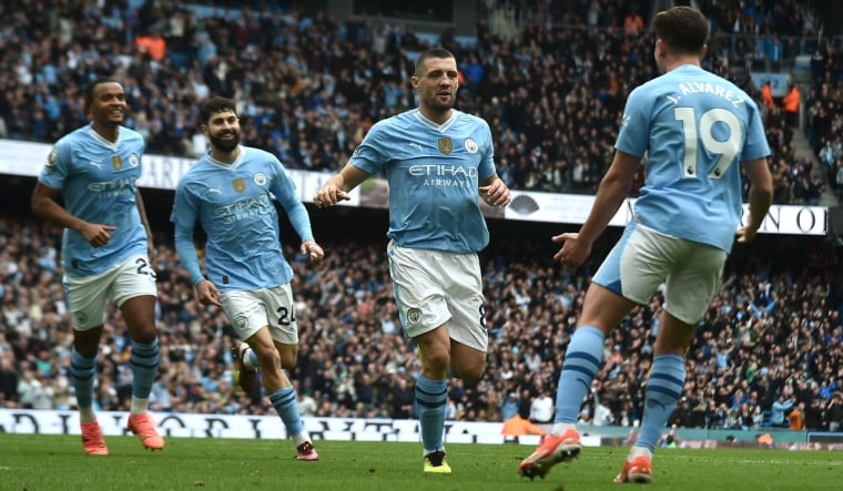 Manchester City's Mateo Kovacic (second right) celebrates with teammates after scoring | AP