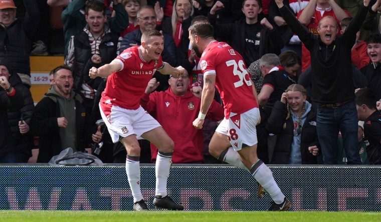 Wrexham's Elliot Lee (R) celebrates with Paul Mullin | AP