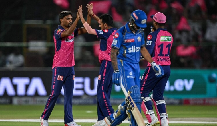 Rajasthan Royals bowler Sandeep Sharma (L) celebrates with teammates after taking the wicket of Mumbai Indians' Suryakumar Yadav | AFP