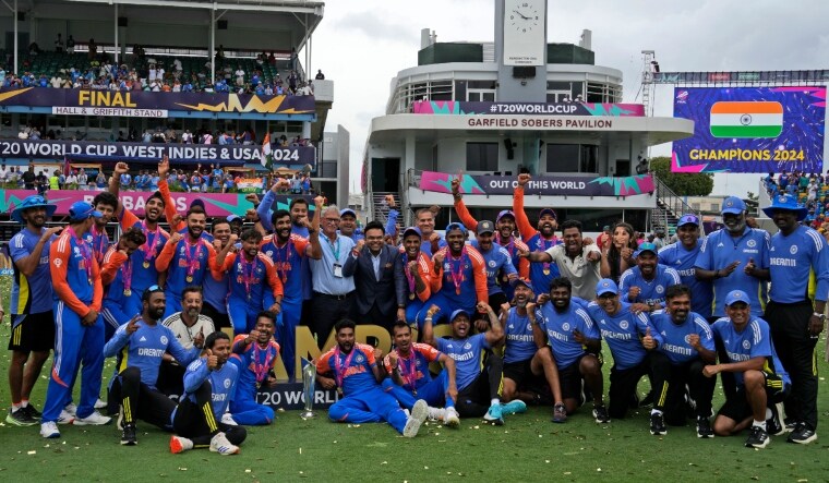 India's players celebrate with the winners' trophy after winning against South Africa in the ICC Men's T20 World Cup final | AP