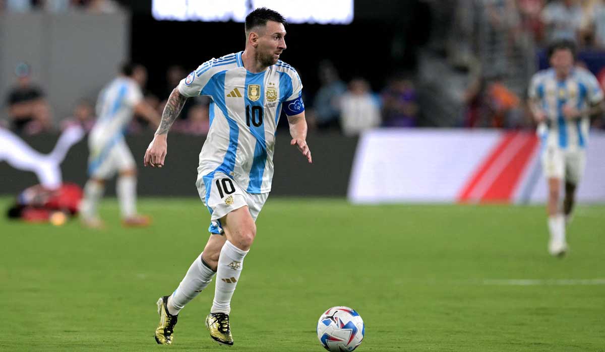 Argentina's forward #10 Lionel Messi controls the ball during the Conmebol 2024 Copa America tournament semi-final football match between Argentina and Canada at MetLife Stadium, in East Rutherford, New Jersey | AFP
