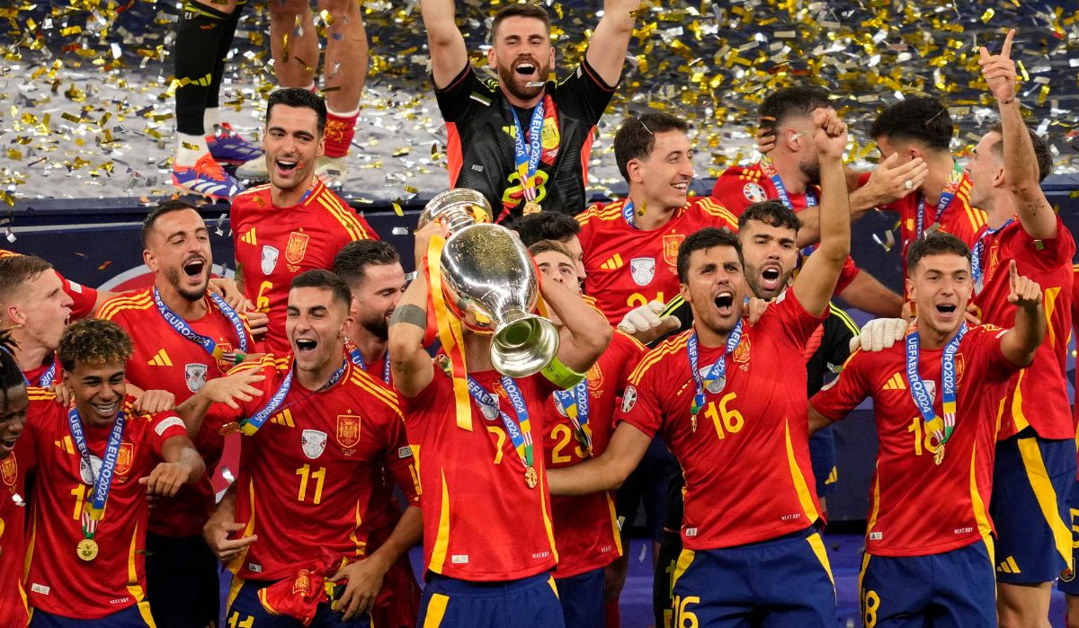 Spain's players celebrate with the trophy after winning the final match between Spain and England at the Euro 2024 soccer tournament in Berlin, Germany, Sunday, July 14, 2024 | AP/PTI