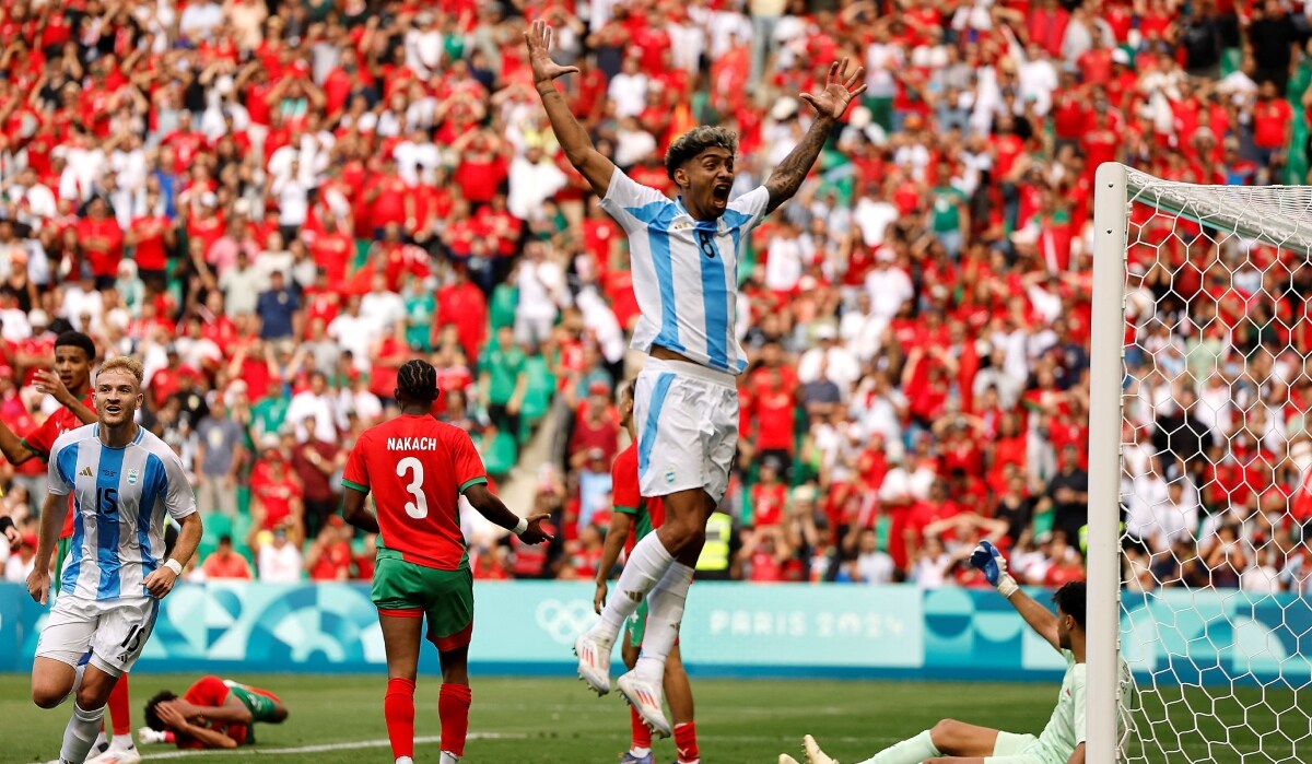 Cristian Medina of Argentina celebrates scoring against Morocco | Reuters
