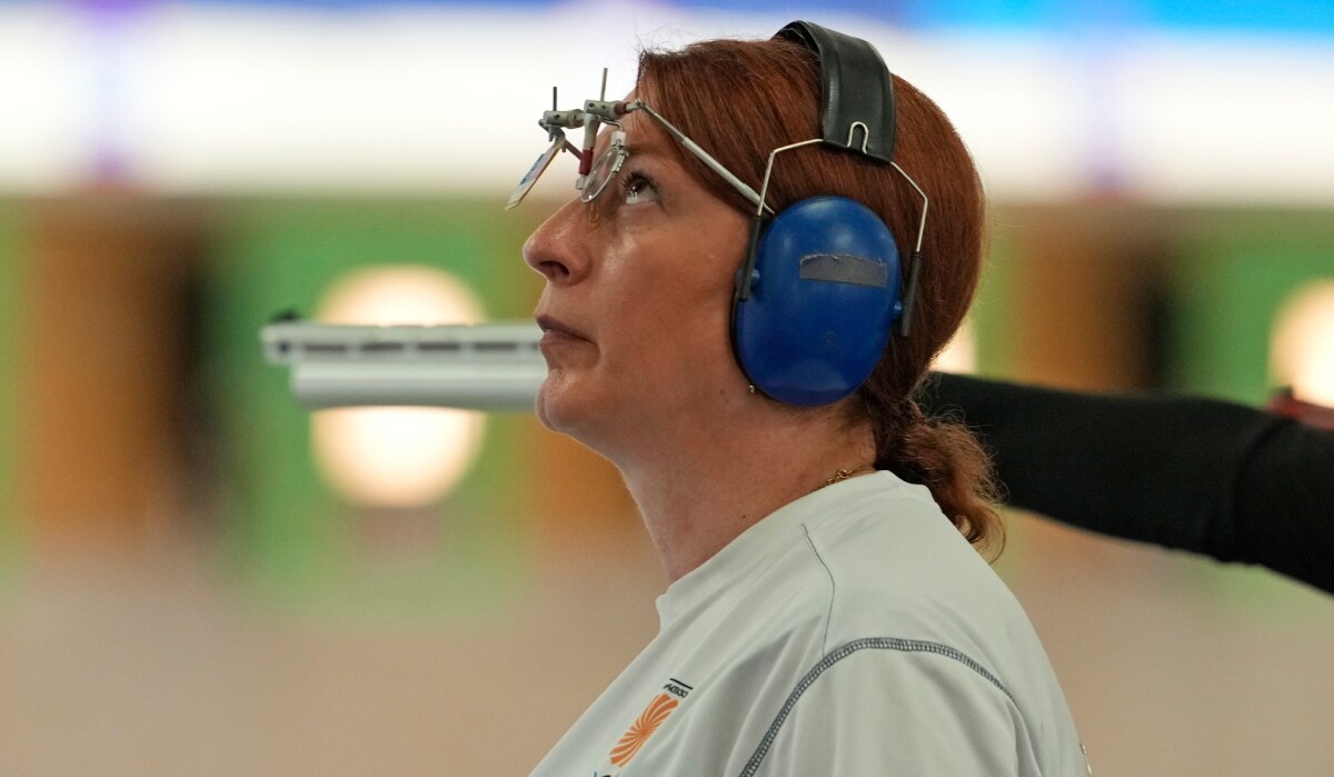Georgia's Nino Salukvadzegestures during the 10m air pistol women's qualification round at the 2024 Summer Olympics | AP
