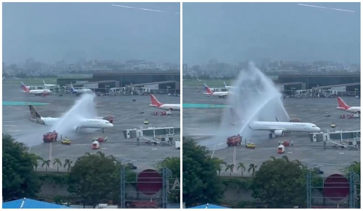 The flight carrying Team India receiving a water salute at Mumbai airport | X