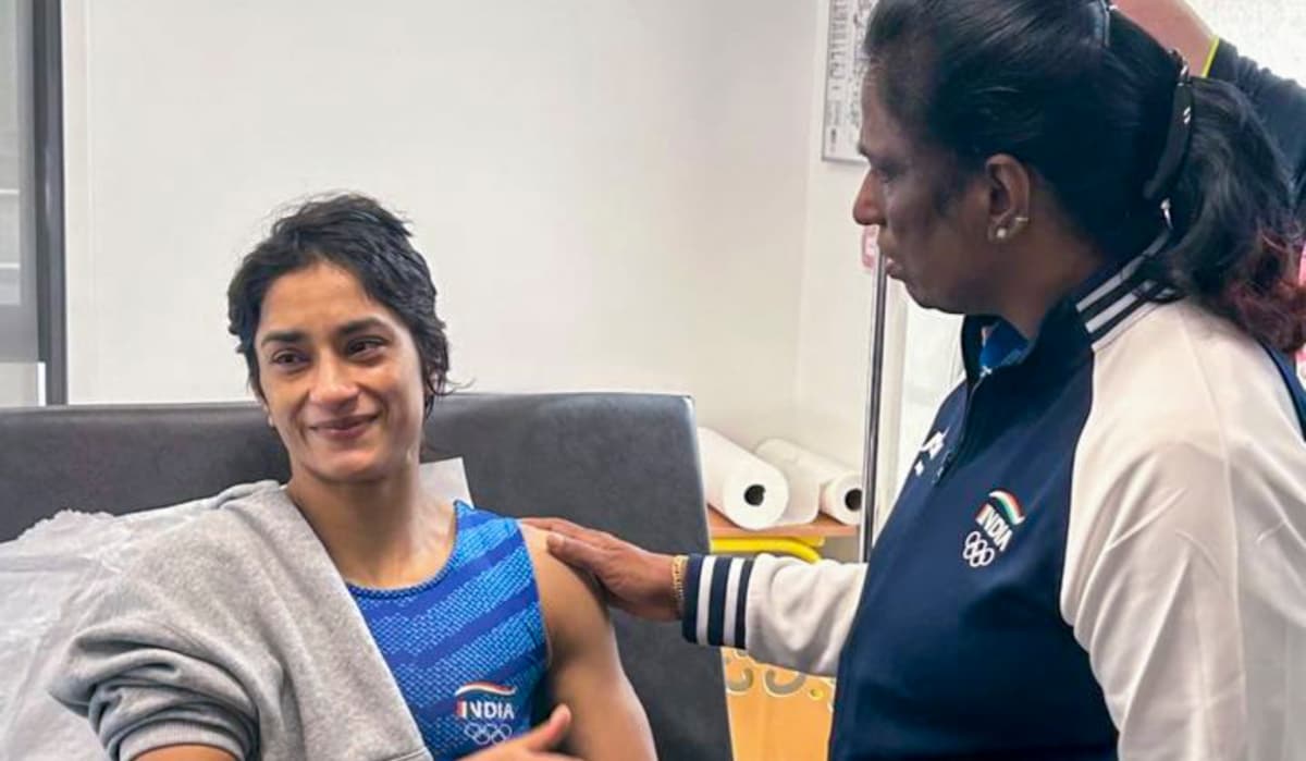 Indian Olympics Association (IOA) President PT Usha meets wrestler Vinesh Phogat after the latter was hospitalised following her disqualification from the Paris Olympics | PTI