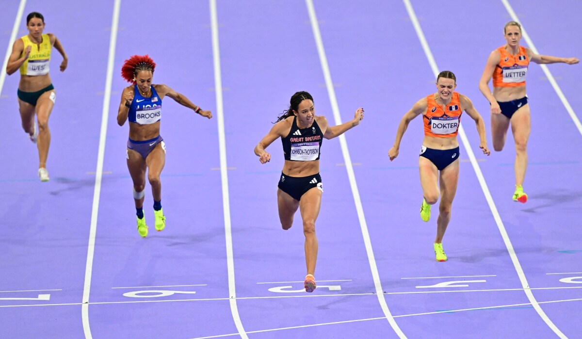 Britain's Katarina Johnson-Thompson crosses the finish line ahead of Australia's Tori West, US' Taliyah Brooks, Netherlands' Sofie Dokter and Netherlands' Anouk Vetter in the women's heptathlon 200m oat Paris Olympics | AFP