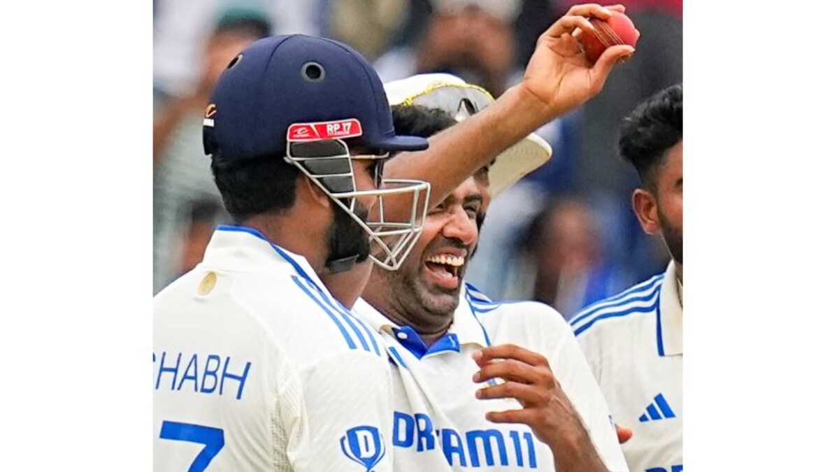 India's Ravichandran Ashwin with teammates shows the ball after taking 5 wickets on the fourth day of the first Test cricket match against Bangladesh PTI
