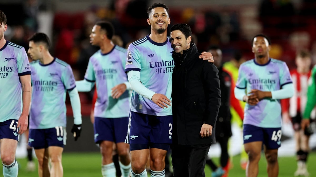 Arsenal's William Saliba and manager Mikel Arteta | Reuters
