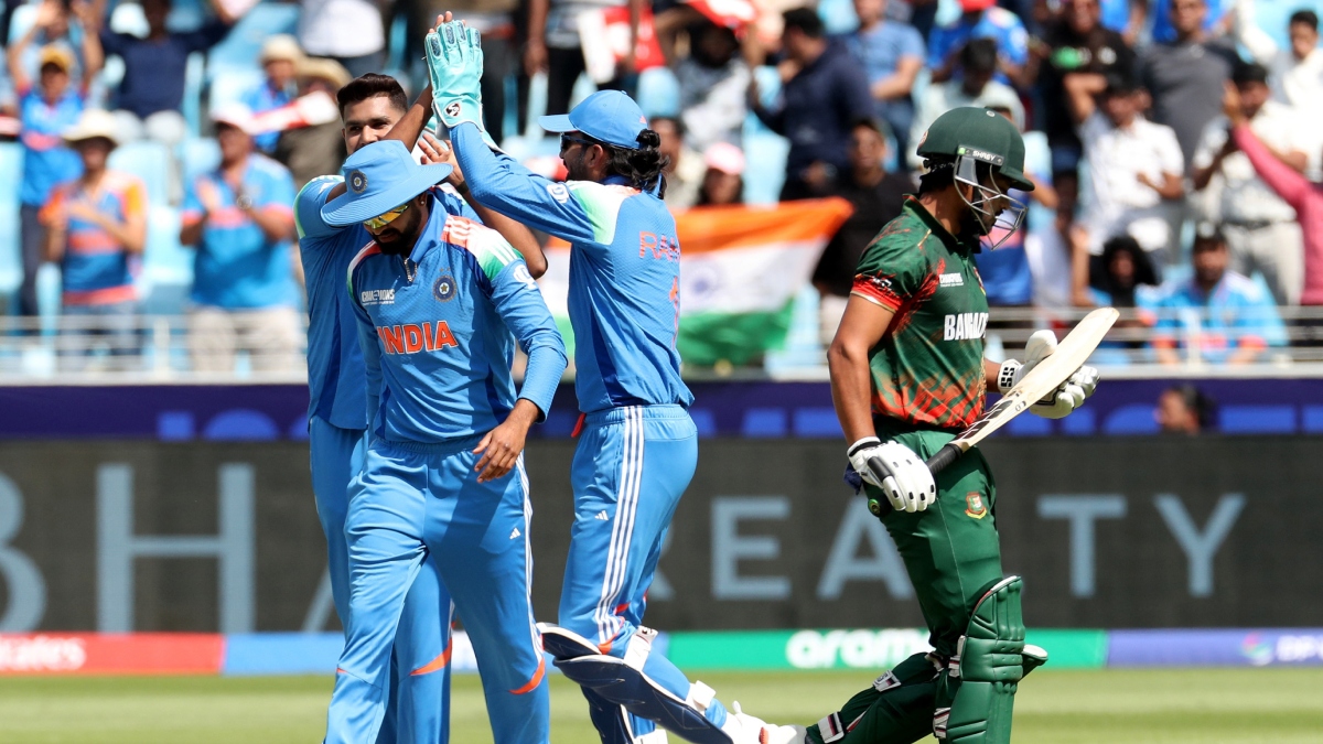 Bangladesh's Najmul Hossain Shanto walks back to the pavilion after losing his wicket against India | Reuters