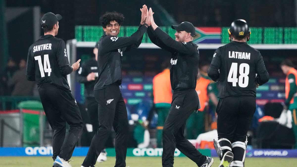 New Zealand's Rachin Ravindra, second left, celebrates with teammates after the dismissal of South Africa's Aiden Markram | AP