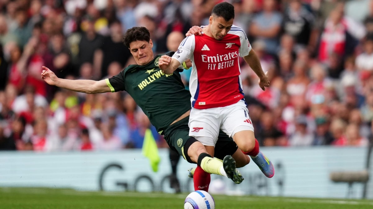 Brentford's Christian Norgaard (L)  fouls Arsenal's Gabriel Martinelli | AP