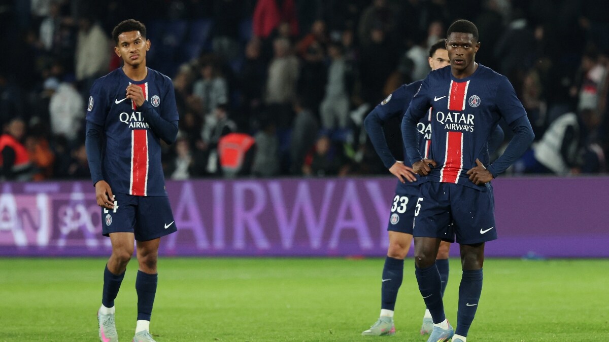 Paris St Germain's Nuno Mendes and Senny Mayulu look dejected after the game | Reuters