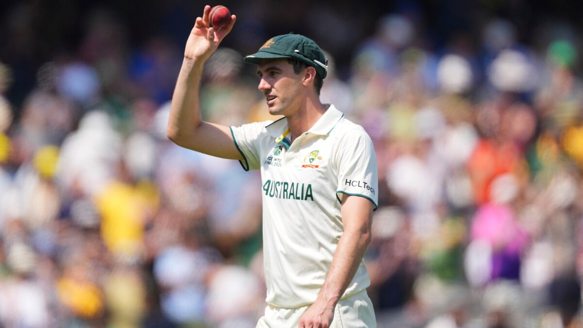 Pat Cummins holds up the ball to celebrate his six-wicket haul on day two of the World Test Championship final between South Africa and Australia at Lord's cricket ground in London | AP