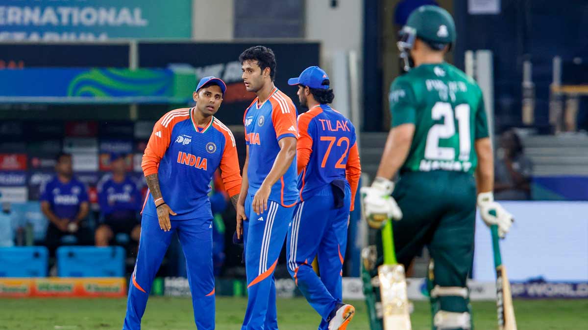 India's Shivam Dube celebrates with captain Suryakumar Yadav after taking the wicket of Pakistan's Sahibzada Farhan | PTI