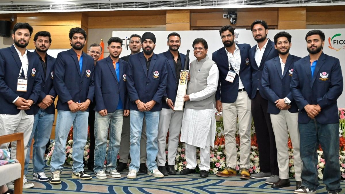 Union Minister Piyush Goyal receives a GI-tagged Willow Bat from the Jammu & Kashmir cricket team, champions of the 2026 Ranji Trophy | X