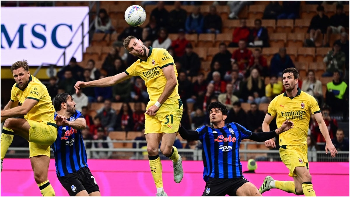 AC Milan's Serbian defender Strahinja Pavlovic (31) heads the ball to score | AFP