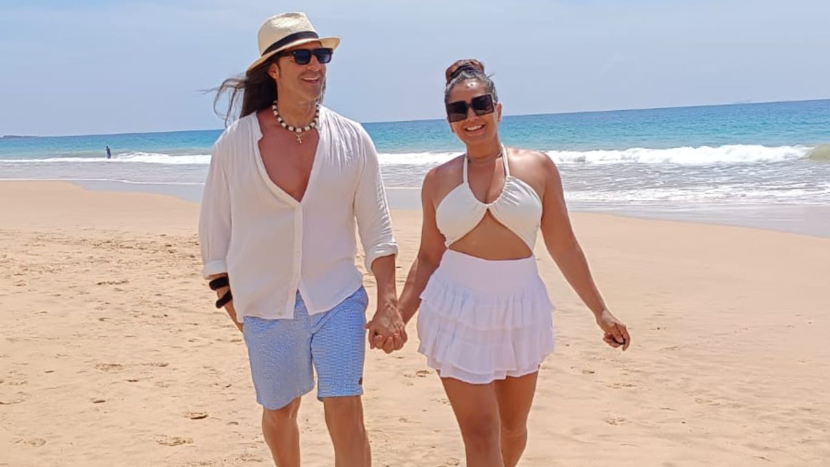 Actor Meghna Naidu (right) with husband Luis in a beach in Sri Lanka | via Meghna Naidu
