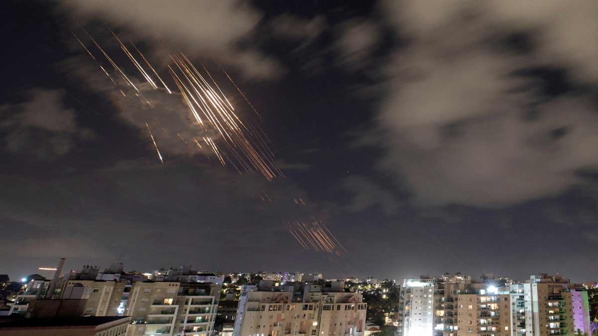 Israel's Iron Dome anti-missile system intercepts rockets after Iran fired a salvo of ballistic missiles, as seen from Ashkelon, Israel | Reuters