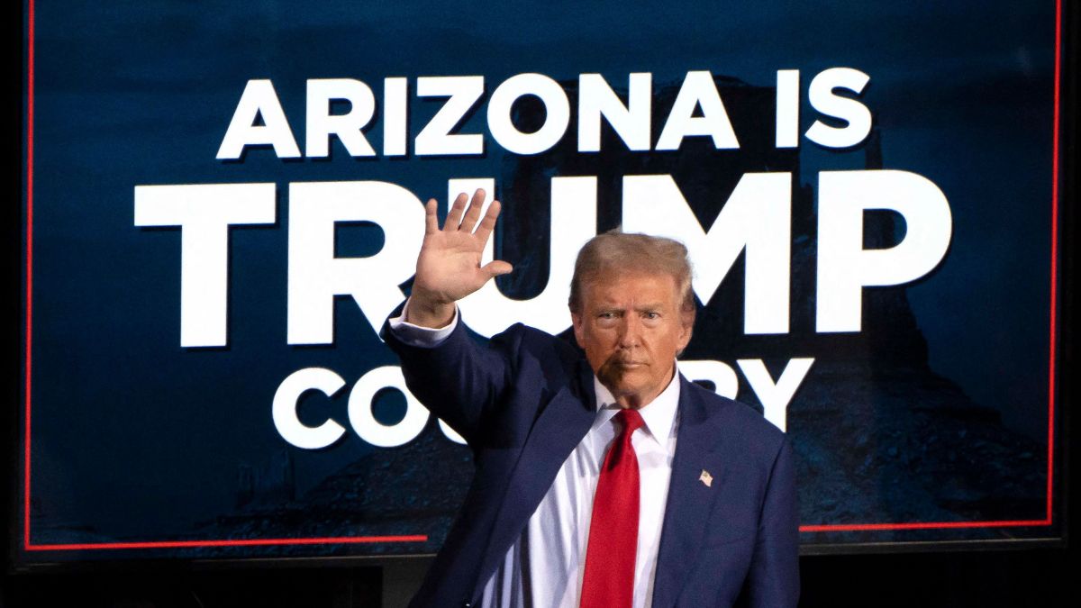 Former US President and Republican presidential candidate Donald Trump waves as he leaves after speaking during a campaign event at the Tucson Music Hall in Tucson, Arizona, September 12, 2024 | AFP