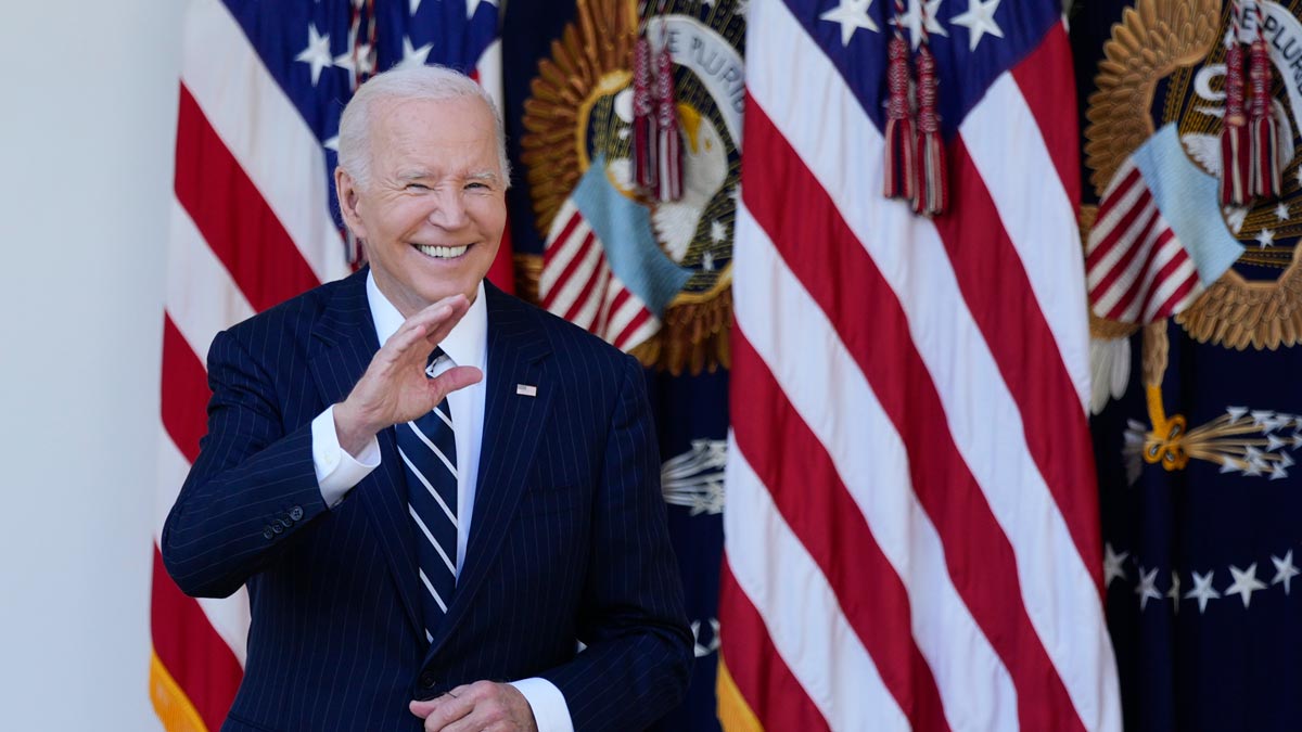 President Joe Biden waves to the audience after speaking in the Rose Garden of the White House | AP