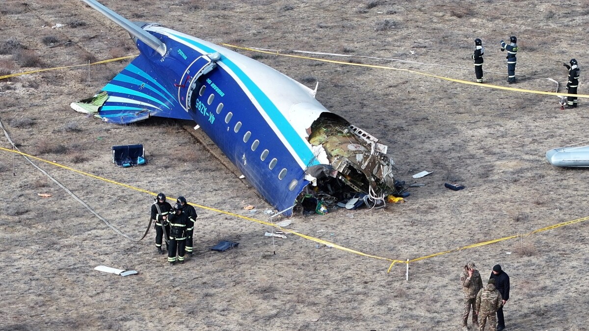 A drone view shows emergency specialists working at the crash site of an Azerbaijan Airlines passenger plane near the city of Aktau, Kazakhstan | Reuters