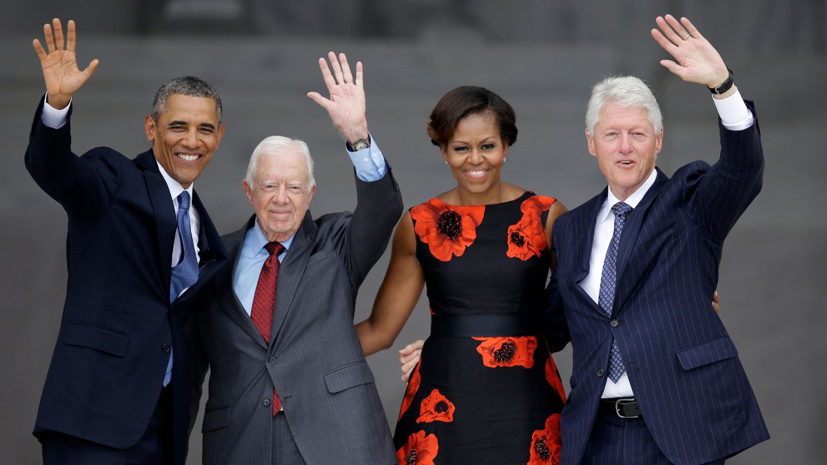 Former President Barack Obama, former President Jimmy Carter, first lady Michelle Obama and former President Bill Clinton
