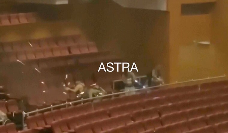 This grab taken from a UGC video shows gunmen shooting in a concert hall in Krasnogorsk, western edge of Moscow region, Russia | AP/PTI